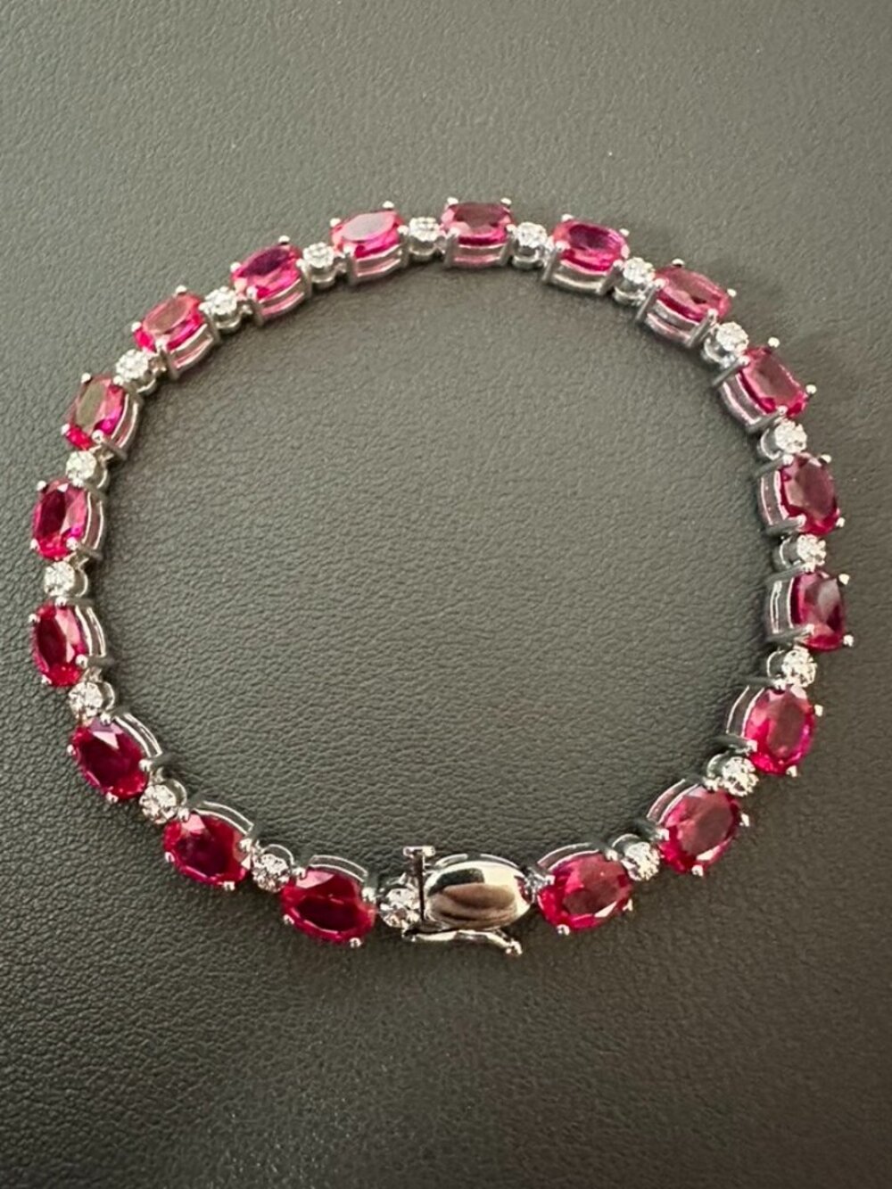 Lab created Oval Ruby Rhodium Over Sterling Silver Tennis Bracelet 7.5"